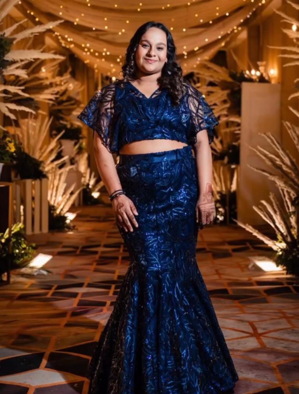 fashion design mood board with fabric swatches, sketches, and antique sewing tools